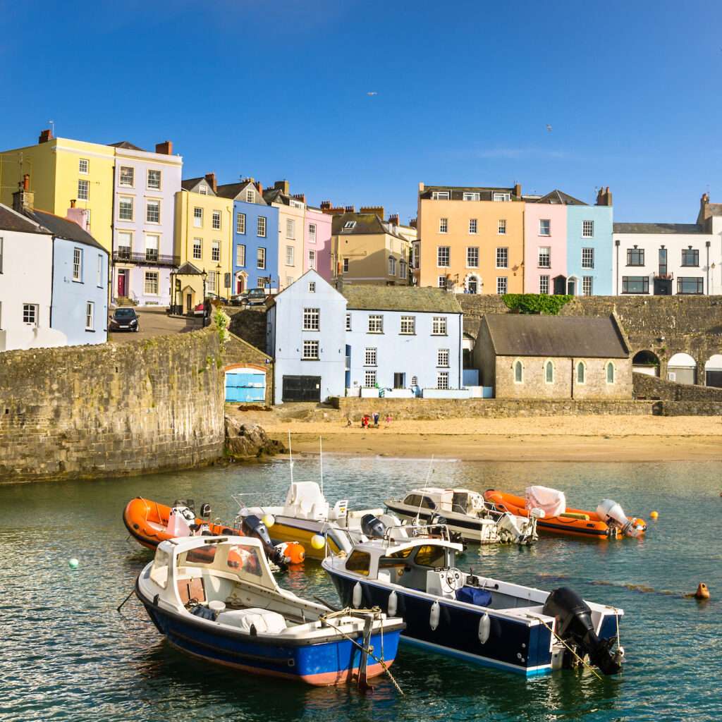 Pastel Coloured Buildings alongside a Harbour in the town of Tenby, Wales